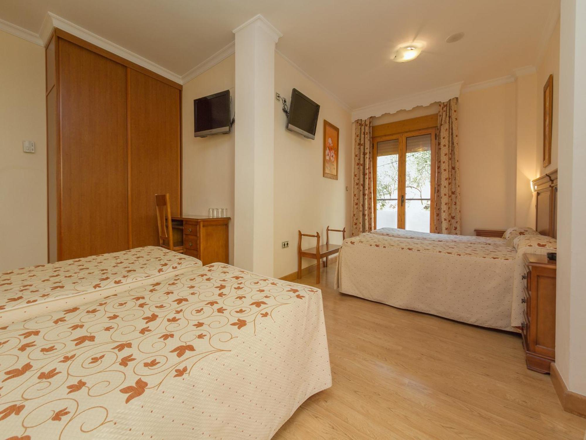 Habitación Cuádruple (2 adultos + 2 niños)